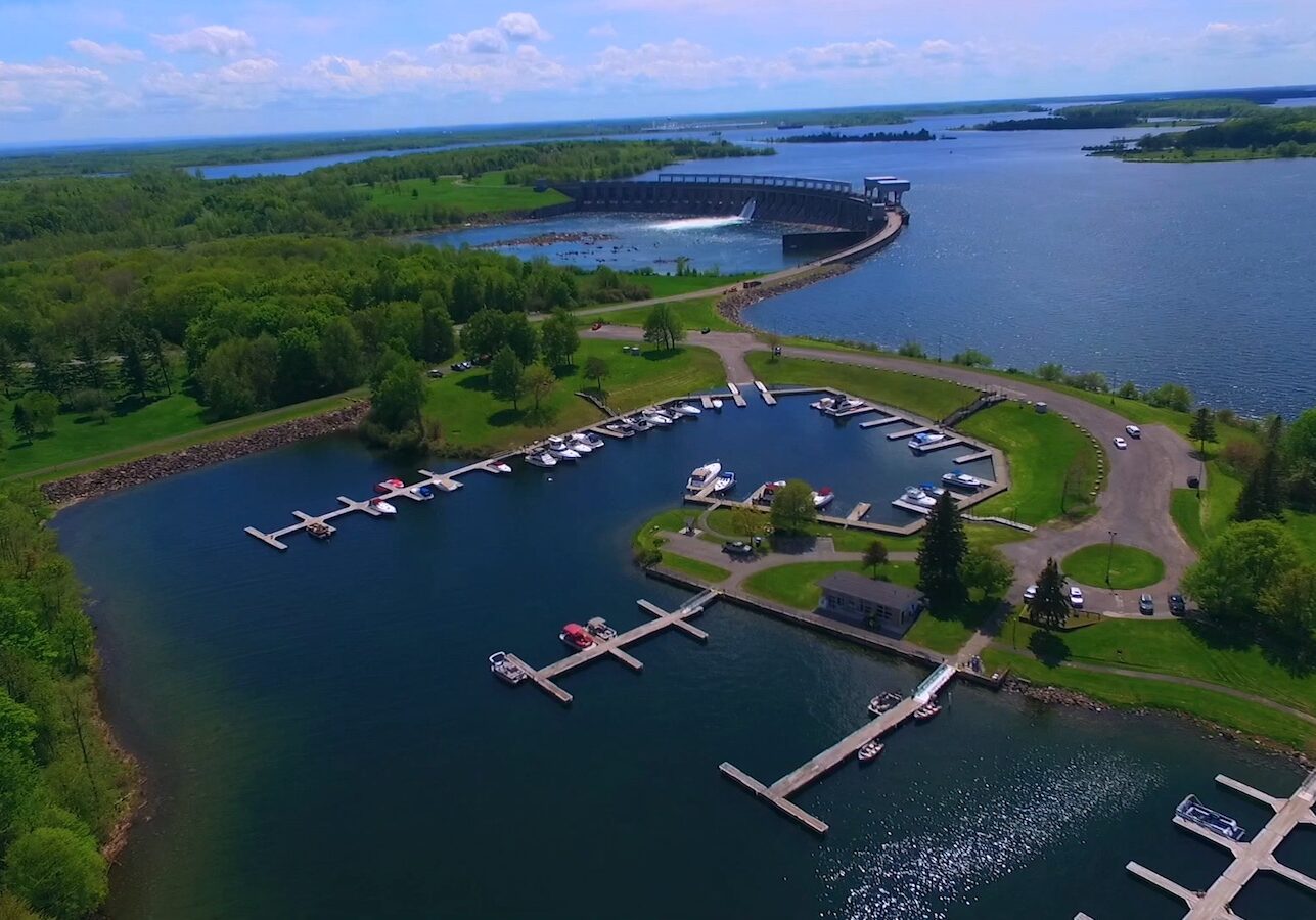 aerial view of river with docks and a dam