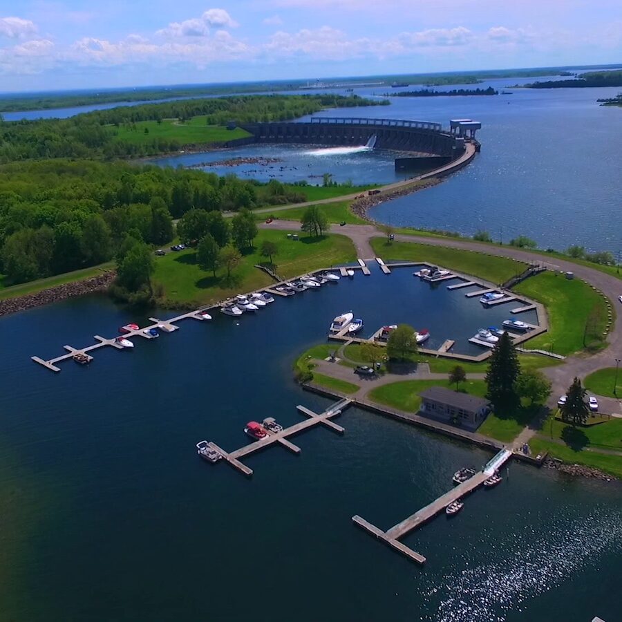 aerial view of river with docks and a dam