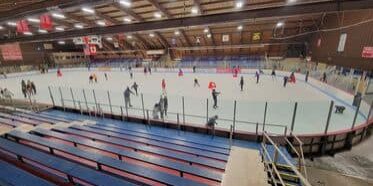massena ice rink with people skating
